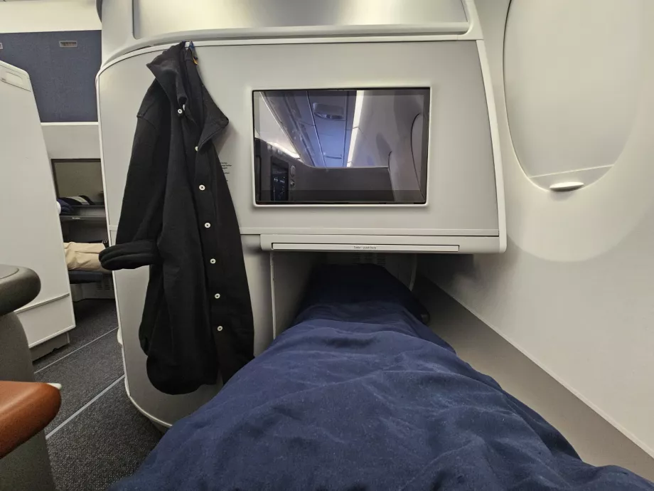 S'allonger sur un siège pliant