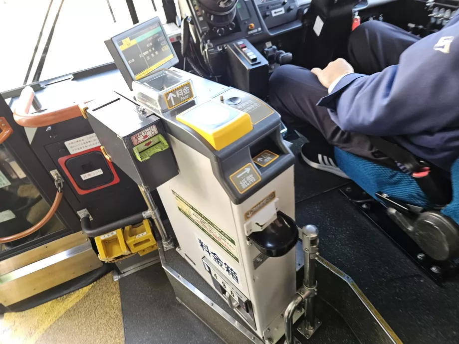 Paiement des tarifs à Kobe